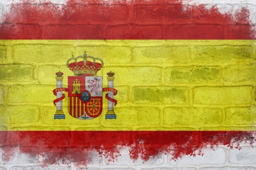 Flag of Spain painted on a brick wall
