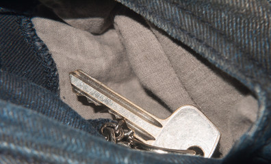 keys in pocket of jeans close up detail