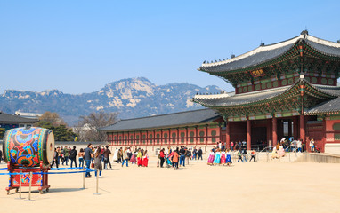 domestic and international tourists visit Gyeongbokgung Palace in Seoul, Korea