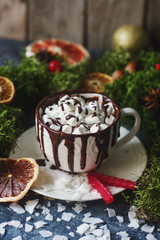 Obraz na płótnie Canvas Cup of hot chocolate or cocoa with marshmallows and cinnamon, christmas or new year decoration