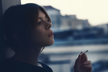 girl smoking a cigarette  © Blackdorian