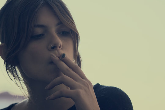 girl smoking a cigarette 