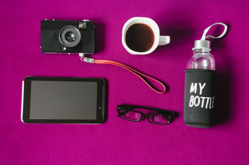 working space. hot strong coffee. camera and tablet. my bottle