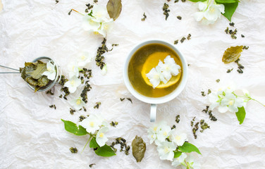Green and jasmine tea mixture in a cup