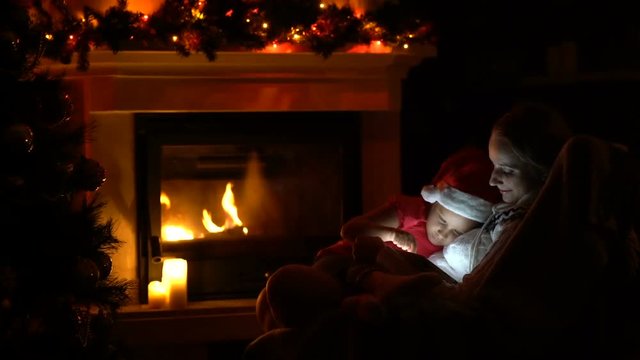 Mom and daughter spend the evening before Christmas together