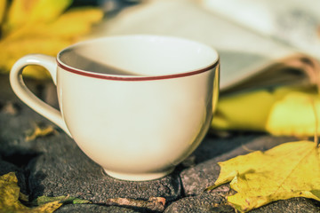 Cup of coffee on the pavement