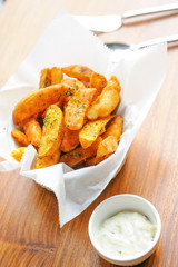 Homemade french fries serve with sour cream