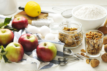 Ingredients for baking apple and nuts pie