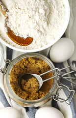 Flour, brown sugar and eggs for baking