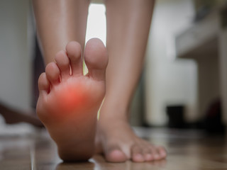 Closeup female foot pain, Health care concept.