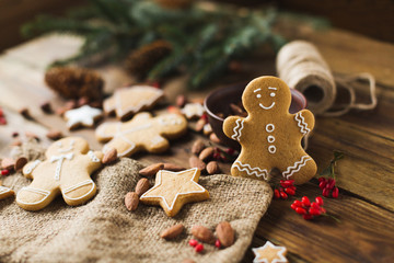 Ginger men on a wooden background. Gingerbread. Christmas cookies