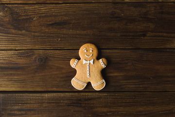 Ginger men on a wooden background. Gingerbread. Christmas cookies