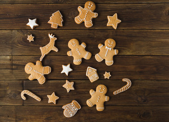 Ginger men on a wooden background. Gingerbread. Christmas cookies