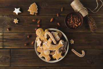 Ginger men on a wooden background. Gingerbread. Christmas cookies