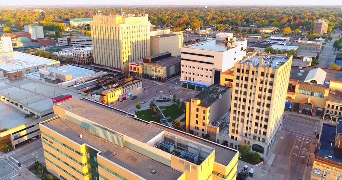 Sunrise flyover of beautiful Autumn colors in downtown Appleton Wisconsin.
