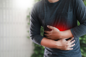 MAN with symptomatic acid reflux , suffering from acid reflux