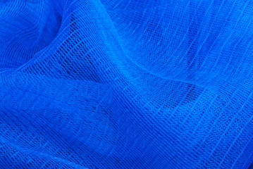Blue plastic net texture