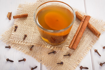Traditional compote of dried fruits and spices on white boards