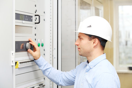 Engineer checking power plant parameters