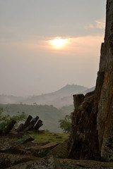 Sunrise at the megalithic site in West Java, Indonesia. It has thousands of ancient stones