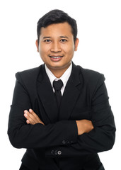 Portrait of a businessman with arms folded. Isolated on white background