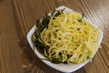 Close up shot of the delicious braised kelp and potato slice