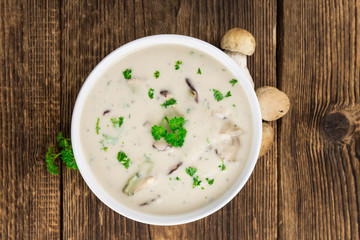Fresh made Porcini Soup on a rustic background
