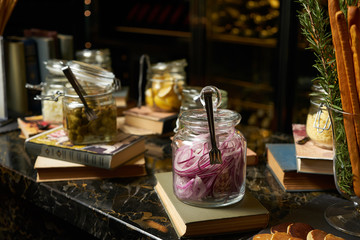 Jar with variety of pickled vegetables