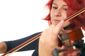 Beautiful young woman playing the violin