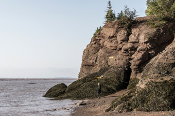 Fototapeta na wymiar famous Hopewell Rocks geologigal formations at low tide biggest tidal wave Fundy Bay New Brunswick Canada