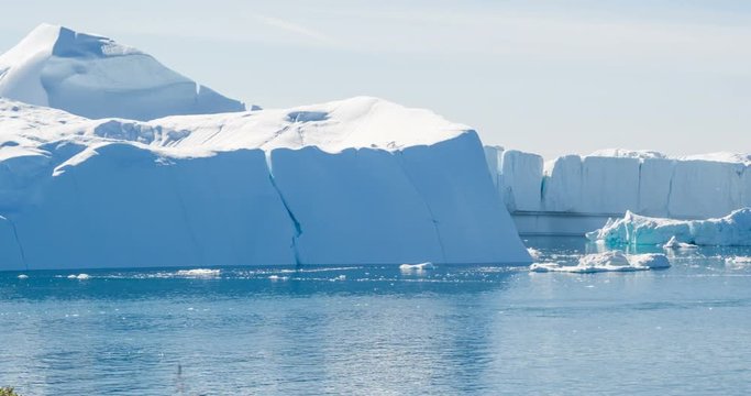 Greenland Iceberg landscape of Ilulissat icefjord with giant icebergs. Icebergs from melting glacier. Arctic nature.
