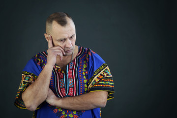 charismatic man in shirt color