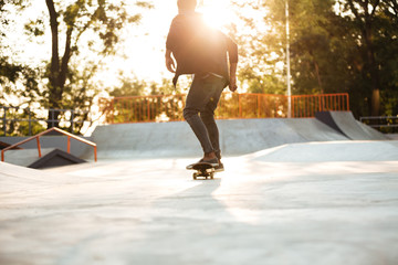 Young afro american skateboarder skating © Drobot Dean