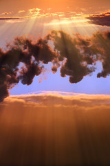 Dramatic sun rays and clouds