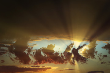 Dramatic sun rays and clouds