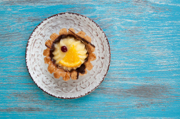 Beige plate with a cake