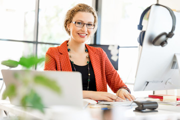 Young woman in office