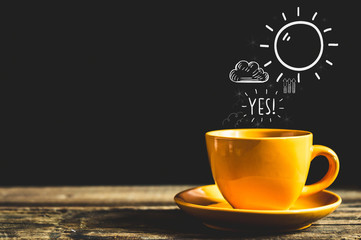 Black coffee in yellow coffee cup, Put on an old wood table.