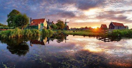 Fototapeta na wymiar Netherlands windmills at sunset, landscape.