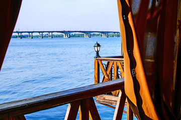 Beautiful View of the river Dnieper from a restaurant at an autumn day. Dnipro city, Ukraine