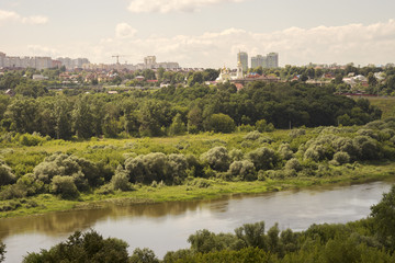 Fototapeta na wymiar Панорама города Калуги и реки Оки с высокого берега. Лето.