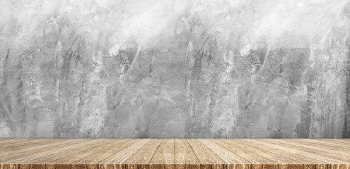 Wood plank table top at grey grunge concrete wall background,Mock up for display or montage of product,Banner or header for advertise on social media.