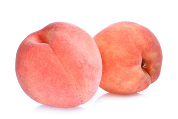 two whole of peach isolated on the white background