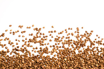 Scattering of buckwheat on white background