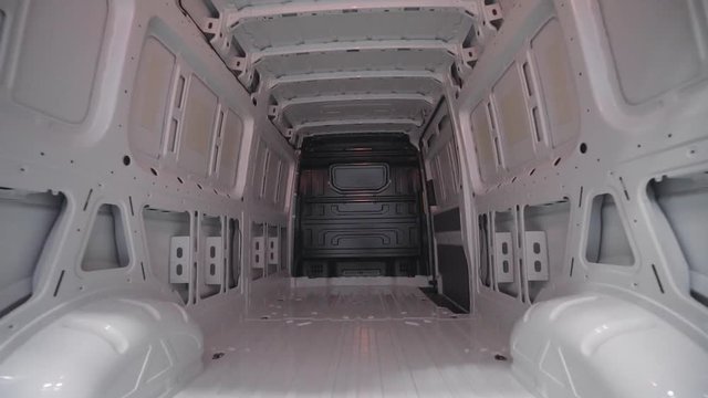 Cargo minivan, view of the cargo hold, camera movement.

