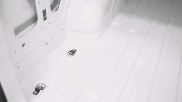 Cargo minivan, view of the cargo hold, camera movement.
