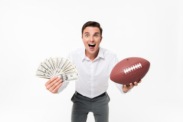 Portrait of an excited positive man in white shirt