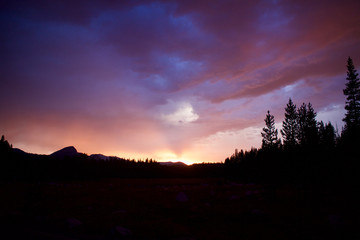 Colorful sunset clouds / Violet thunder storm at evening