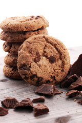 Chocolate cookies on wooden table. Chocolate chip cookies shot.
