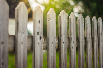 wood fence on green background.